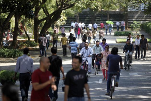 Infosys Technologies employees move through the headquarters during a break in Bangalore, India. The shares of top Indian IT companies are falling in response to news of proposed U.S. legislation that would require salaries for H-1B visa holders to be doubled to make it harder for companies to replace American workers with those from countries like India. (AP) Infosys Technologies employees move through the headquarters during a break in Bangalore, India. The shares of top Indian IT companies are falling in response to news of proposed U.S. legislation that would require salaries for H-1B visa holders to be doubled to make it harder for companies to replace American workers with those from countries like India. (AP)