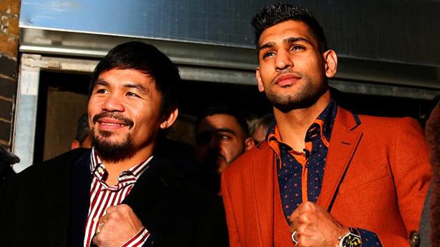 Manny Pacquiao and Amir Khan pose after holding discussions about the possibility of a future fight in London.(Getty Images) Manny Pacquiao and Amir Khan pose after holding discussions about the possibility of a future fight in London.(Getty Images)