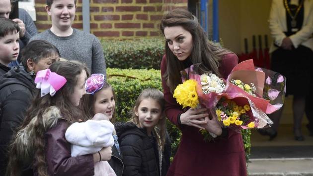 Visiting a mental health center for children in South Wales on Wednesday, the former Kate Middleton spent time talking to children and teens with mental health issues before picking up a pool cue. (Rebecca Naden / REUTERS)