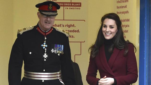 Kate, who wore a burgundy suit paired with knee-high boots, impressed in the style stakes - but her pool skills left much to be desired.The organisation helps all types of families, supporting children and carers through fostering and adoption and intervening early to stop neglect and abuse. (Rebecca Naden / REUTERS)