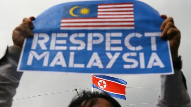 A member of the youth wing of the National Front, Malaysia's ruling coalition, holds a placard during a protest at the North Korea embassy following the murder of Kim Jong Nam on February 23, 2017. (Reuters) A member of the youth wing of the National Front, Malaysia's ruling coalition, holds a placard during a protest at the North Korea embassy following the murder of Kim Jong Nam on February 23, 2017. (Reuters)