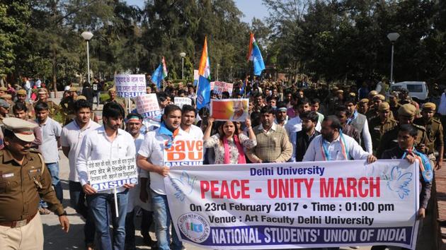 The congress student wing NSUI protested at The Faculty of Arts, Delhi University Campus and carried out a peace march condemning what took place the previous day, in New Delhi. The NSUI students have alleged a failure on part of the police and they have also blamed ABVP for stopping the peaceful protests and attacking the protesters. (Burhaan Kinu/HT PHOTO)