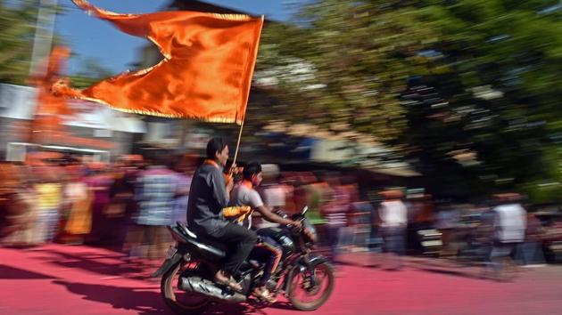 ZOOMING PAST THE RIVALS: Supporters of Sena candidate Suhas Wadkar after his win. (Pratham Gokhale/HT PHOTO) 