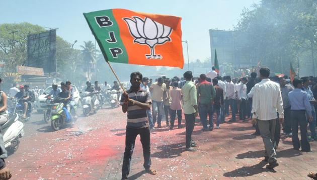 BJP workers celebrate in Pune.(HT Photo)