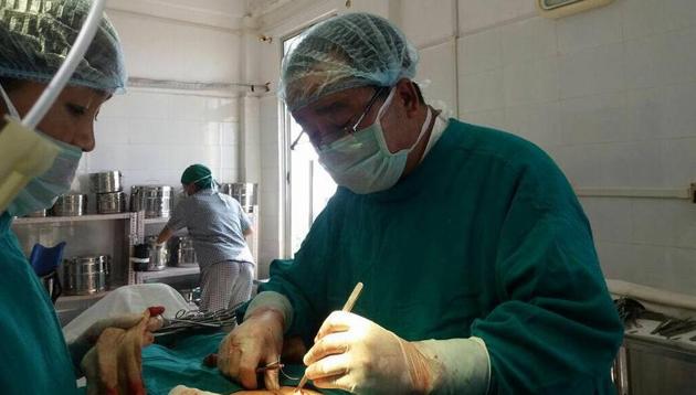 Dr K Beichhua performing an emergency surgery on a woman at the Saiha civil hospital on Wednesday. (HT Photo) Dr K Beichhua performing an emergency surgery on a woman at the Saiha civil hospital on Wednesday. (HT Photo)