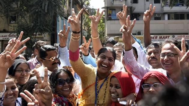 Congress supporters celebrate the victory of candidate Ganga Mane at Dadar on Thursday. (Kunal Patil/ Hindustan Times) Congress supporters celebrate the victory of candidate Ganga Mane at Dadar on Thursday. (Kunal Patil/ Hindustan Times)
