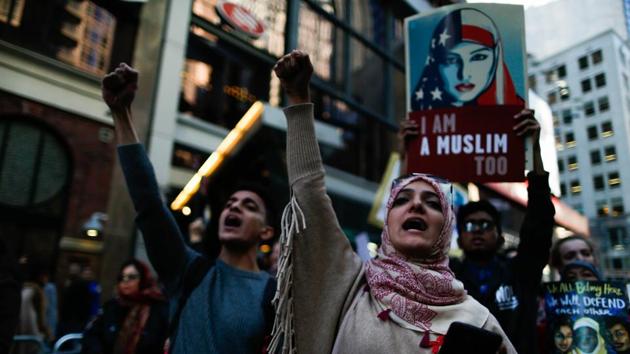 People take part in a rally dubbed ‘I Am A Muslim Too’ in a show of solidarity with American Muslims at Times Square.(AFP File Photo) People take part in a rally dubbed ‘I Am A Muslim Too’ in a show of solidarity with American Muslims at Times Square.(AFP File Photo)