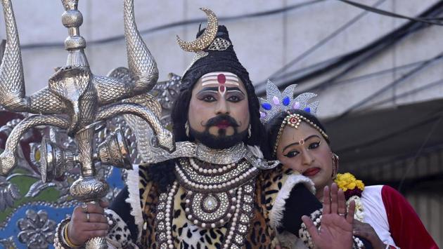 Artist dressed as Lord Shiva during Maha Shivratri  yatra at Gate Hakima in Amritsar on Friday. (Gurpreet Singh/HT Photo) 