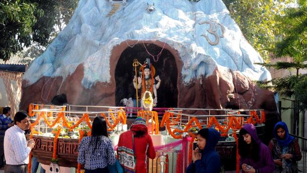 Devotees at Lord Shiva temple during pooja on the occasion of Maha Shivratri at PGI in Chandigarh on Friday. (Anil Dayal/HT Photo)