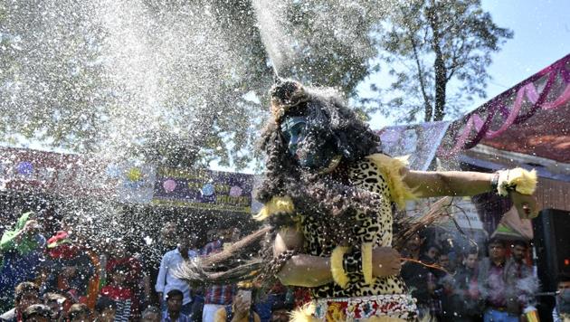 Artist dressed as Lord Shiva in sector 15 Market, Chandigarh, on the occasion of Maha Shivratri on Friday. (Ravi Kumar/HT Photo)