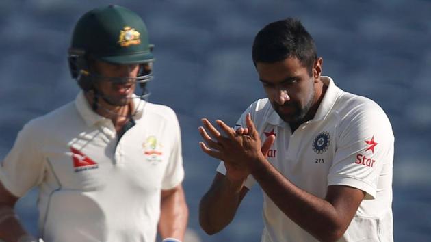 Ravichandran Ashwin celebrates the wicket of Australia's Mitchell Starc on Day 2 of the Pune Test between India vs Australia.(REUTERS)