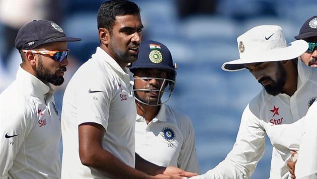 Pune: Indian bowler R Ashwin celebrates with teammates the wicket of Australian batsman Matt Renshaw on the first day of the first test match in Pune on Thursday. PTI Photo by Shashank Parade (PTI2_23_2017_000099B)(PTI)