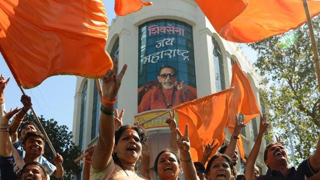 Members of the Shiv Sena party take part in a rally after victory in the Brihanmumbai Municipal Corporation (BMC) election in Mumbai on February 23. (AFP Photo) Members of the Shiv Sena party take part in a rally after victory in the Brihanmumbai Municipal Corporation (BMC) election in Mumbai on February 23. (AFP Photo)