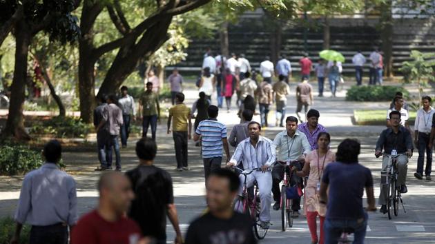 In this file photo, Infosys Technologies employees move through the headquarters during a break in Bangalore. Senior IT industry leaders claim any curb on H-1B visa by the Donald Trump administration will severely impact the US economy. (AP /For representational purpose only) In this file photo, Infosys Technologies employees move through the headquarters during a break in Bangalore. Senior IT industry leaders claim any curb on H-1B visa by the Donald Trump administration will severely impact the US economy. (AP /For representational purpose only)