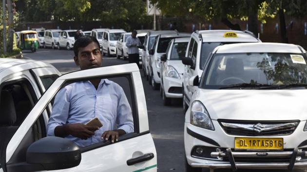Ola and Uber drivers during a protest at Jantar Mantar, February 14. Both Ola and Uber have run into problems with their drivers who see themselves not as the micro-entrepreneurs the two companies claim they are, but employees.(Vipin Kumar/HT PHOTO) Ola and Uber drivers during a protest at Jantar Mantar, February 14. Both Ola and Uber have run into problems with their drivers who see themselves not as the micro-entrepreneurs the two companies claim they are, but employees.(Vipin Kumar/HT PHOTO)