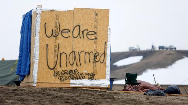 A sign is seen in the main opposition camp. (Terray Sylvester/REUTERS)