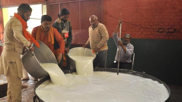 Milk collection on Maha Shivaratri festival at Maha Dev Mandir at Saketri on Friday. (Sant Arora/HT Photo)
