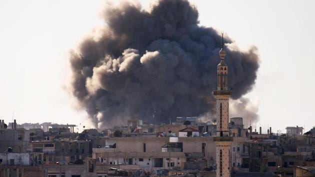 Smoke billows from the rebel-held area of Daraa in southern Syria following an air strike.(AFP File) Smoke billows from the rebel-held area of Daraa in southern Syria following an air strike.(AFP File)