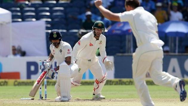 Steve 翱’碍别别蹿别 celebrates after dismissing Virat Kohli in the first Test match between Australia and India in Pune.(BCCI)