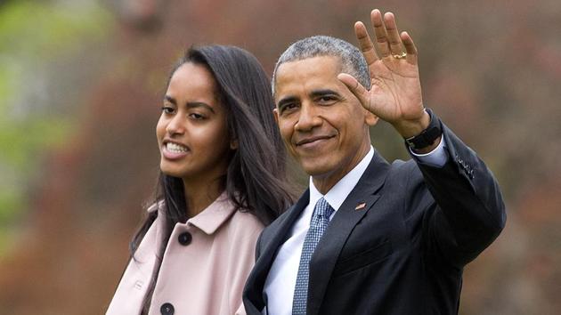 President Barack Obama and his daughter Malia, walk across the South Lawn of the White House in Washington. (AP File Photo) President Barack Obama and his daughter Malia, walk across the South Lawn of the White House in Washington. (AP File Photo)