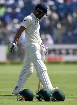 India received a major jolt as captain Virat Kohli departed for 13 and was dismissed by Steve O’Keefe. (AFP) India received a major jolt as captain Virat Kohli departed for 13 and was dismissed by Steve O’Keefe. (AFP)