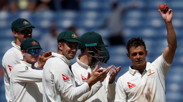 Australia's Steve O'Keefe celebrates after his team’s win over India in the first Test match in Pune.(REUTERS)