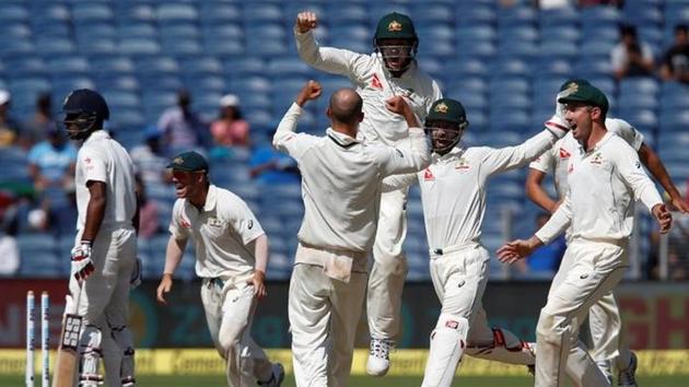 Australia's players celebrate after winning the match against India in Pune. (REUTERS) Australia's players celebrate after winning the match against India in Pune. (REUTERS)