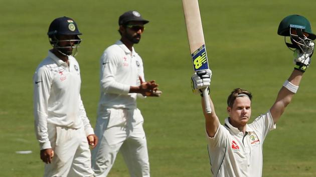 Australia's captain Steve Smith celebrates his century on Day 3 of the Pune Test on Saturday. It was his 18th Test hundred.(REUTERS)