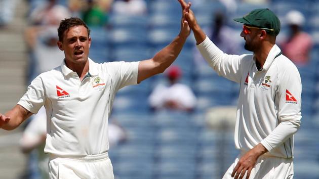 Steve O’Keefe (6/35) and Nathan Lyon (4/53) helped Australia to a 333-run win over India in the first Test at Pune on Saturday. Australia take the lead in the four-Test series.(REUTERS)