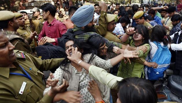 ABVP and AISA members fight during a clash over Ramjas College’s literary festival at North campus, Delhi University. (Raj K Raj/HT PHOTO) ABVP and AISA members fight during a clash over Ramjas College’s literary festival at North campus, Delhi University. (Raj K Raj/HT PHOTO)