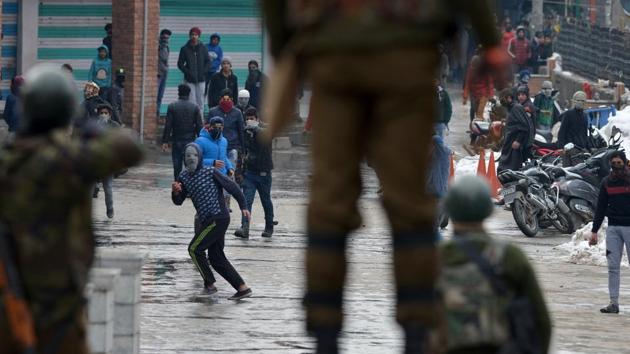 Kashmiri protestors throw stones towards security forces during a clash in January. Former home minister P Chidambaram said he had a sinking feeling that India had nearly lost Kashmir due to the use of excessive force by the security forces to crush dissent there. (AFP File) Kashmiri protestors throw stones towards security forces during a clash in January. Former home minister P Chidambaram said he had a sinking feeling that India had nearly lost Kashmir due to the use of excessive force by the security forces to crush dissent there. (AFP File)