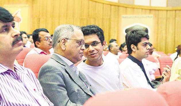 Founder of Infosys NR Narayana Murthy with son Rohan Murthy sitting among the investors during Infosys 34th Annual General meeting in Bengaluru.(Hemant Mishra/ Mint file photo)