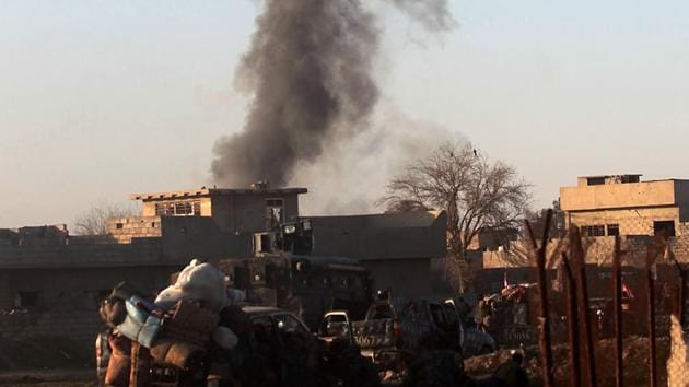 Smoke billows in Mosul's southern neighbourhood of Jawasaq on February 24 during an ongoing offensive by Iraqi troops to retake the northern city from jihadists of the Islamic State group. (AFP/ Representative Photo) Smoke billows in Mosul's southern neighbourhood of Jawasaq on February 24 during an ongoing offensive by Iraqi troops to retake the northern city from jihadists of the Islamic State group. (AFP/ Representative Photo)