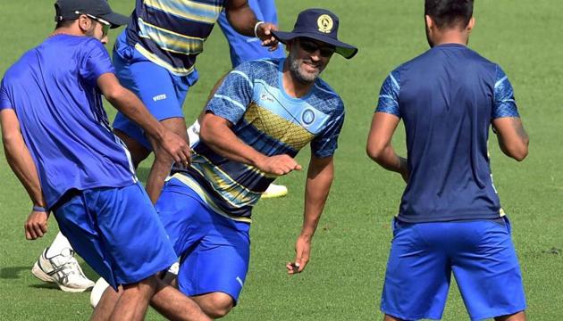 MS Dhoni indulges in a game of football ahead of Jharkhand’s Vijay Hazare Trophy match against Karnataka in Kolkata.(PTI)