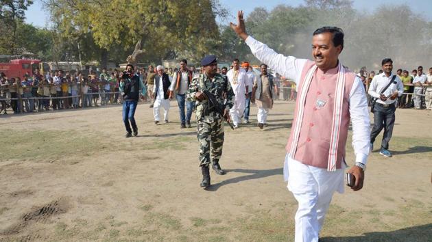 UP BJP President Keshav Prasad Maurya waves at crowd during an election rally in Mirzapur. (PTI)
