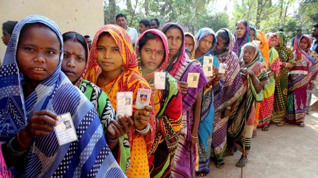 Voters stand in the queue during the last phase of Odisha's panchayat election, Khurda district, February 21.(PTI)