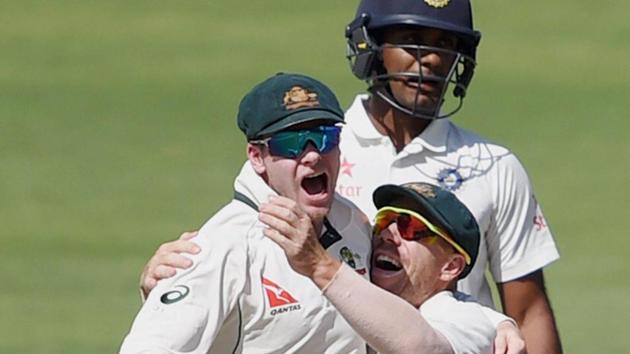 Australian cricket team captain Steve Smith celebrate their victory over India cricket team on Day 3 of the first Test in Pune on Saturday.(PTI)