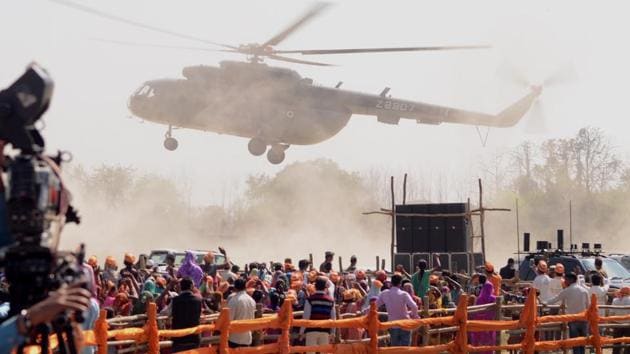 A helicopter flies over the crowd during Prime Minister Narendra Modi’s election rally in Bahraich, Uttar Pradesh. ((HT Photo))