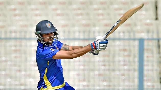 Karnataka cricket team captain Manish Pandey scored 77 runs after getting dropped on zero and 15?, and shared a 116-run stand with R Samarth who made 71. For Jharkhand skipper MS Dhoni scored 43 off 50 balls.(PTI)