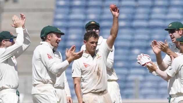 Australia cricket team players applaud Steve O'Keefe’s match-winning performance in the first Test against India cricket team in Pune.(AFP)