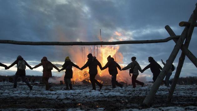 The tradition of Maslenitsa dates back to pagan times, when Russian folk would bid farewell to winter and welcome spring. (Denis Tyrin / AP)