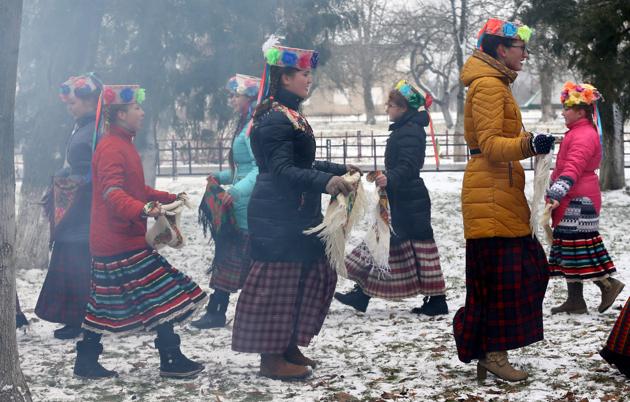 Girls take part in a festive game during celebration of Maslenitsa, or Pancake Week, in the Rachen village, Belarus. (vasily Fedosenko / REUTERS)
