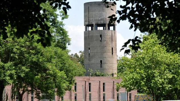 The women climbed the water tank located in Chhani area of the city in the early hours on Sunday and threatened to jump from it. (HT/ Representative Photo) The women climbed the water tank located in Chhani area of the city in the early hours on Sunday and threatened to jump from it. (HT/ Representative Photo)