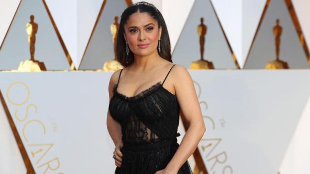 Salma Hayek poses on the red carpet. (REUTERS)