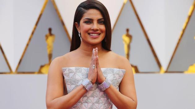 Priyanka Chopra greets her fans with a namastey at the Dolby Theatre in Los Angeles on Monday. (REUTERS)