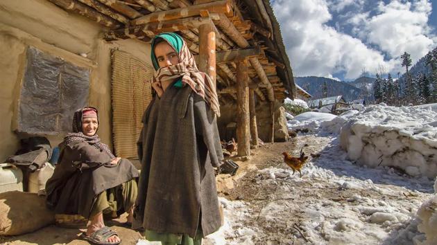 Villagers basking in the sun outside their house at the picturesque village of Daksum in South Kashmir. (Prasun Mitra) Villagers basking in the sun outside their house at the picturesque village of Daksum in South Kashmir. (Prasun Mitra)
