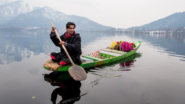 A typical scene of a hawker on a Shikara on the Dal Lake in Kashmir. (Nilakkhya Dutta) A typical scene of a hawker on a Shikara on the Dal Lake in Kashmir. (Nilakkhya Dutta)