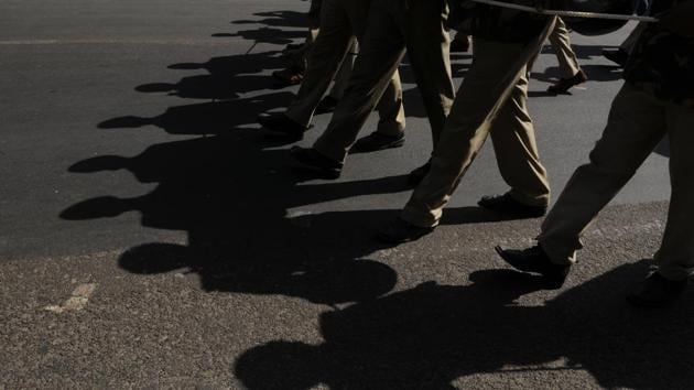 Police force seen during the Tiranga march at Delhi University in New Delhi. (Burhaan Kinu/HT PHOTO)