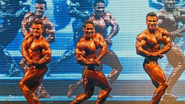 Three’s company: Some from the 90-kg category on stage. (Satyabrata Tripathy/Ht photos) 