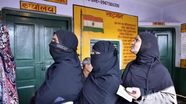 Voters line up to cast their votes at a booth. The phase has heavy stakes for the incumbent SP as it won 36 out of the 51 seats in the last assembly elections held in 2012, BJP and the Congress won five each, BSP won three and the Peace Party won two seats. (Arun Sharma/HT PHOTO) Voters line up to cast their votes at a booth. The phase has heavy stakes for the incumbent SP as it won 36 out of the 51 seats in the last assembly elections held in 2012, BJP and the Congress won five each, BSP won three and the Peace Party won two seats. (Arun Sharma/HT PHOTO)
